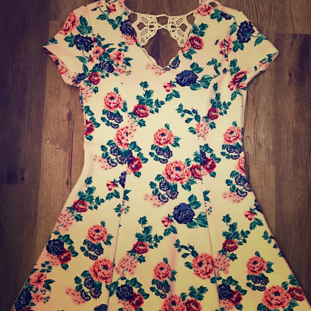 White dress with flower print.